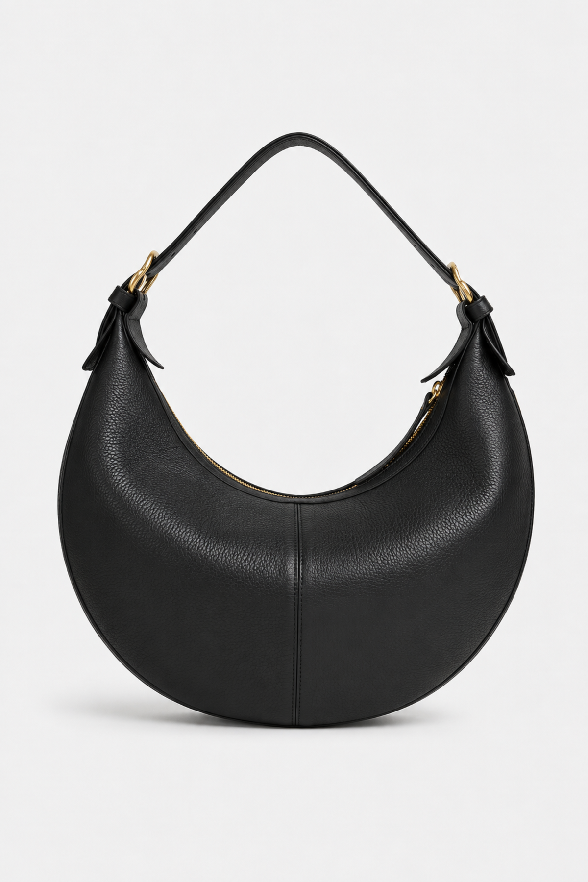 A black pebbled leather crescent-shaped shoulder bag with gold-tone hardware and an adjustable strap