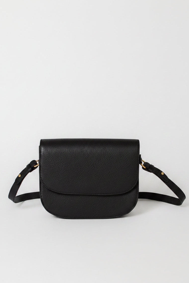 Designer leather saddle bag in black leather fully lined shoulder bag. 