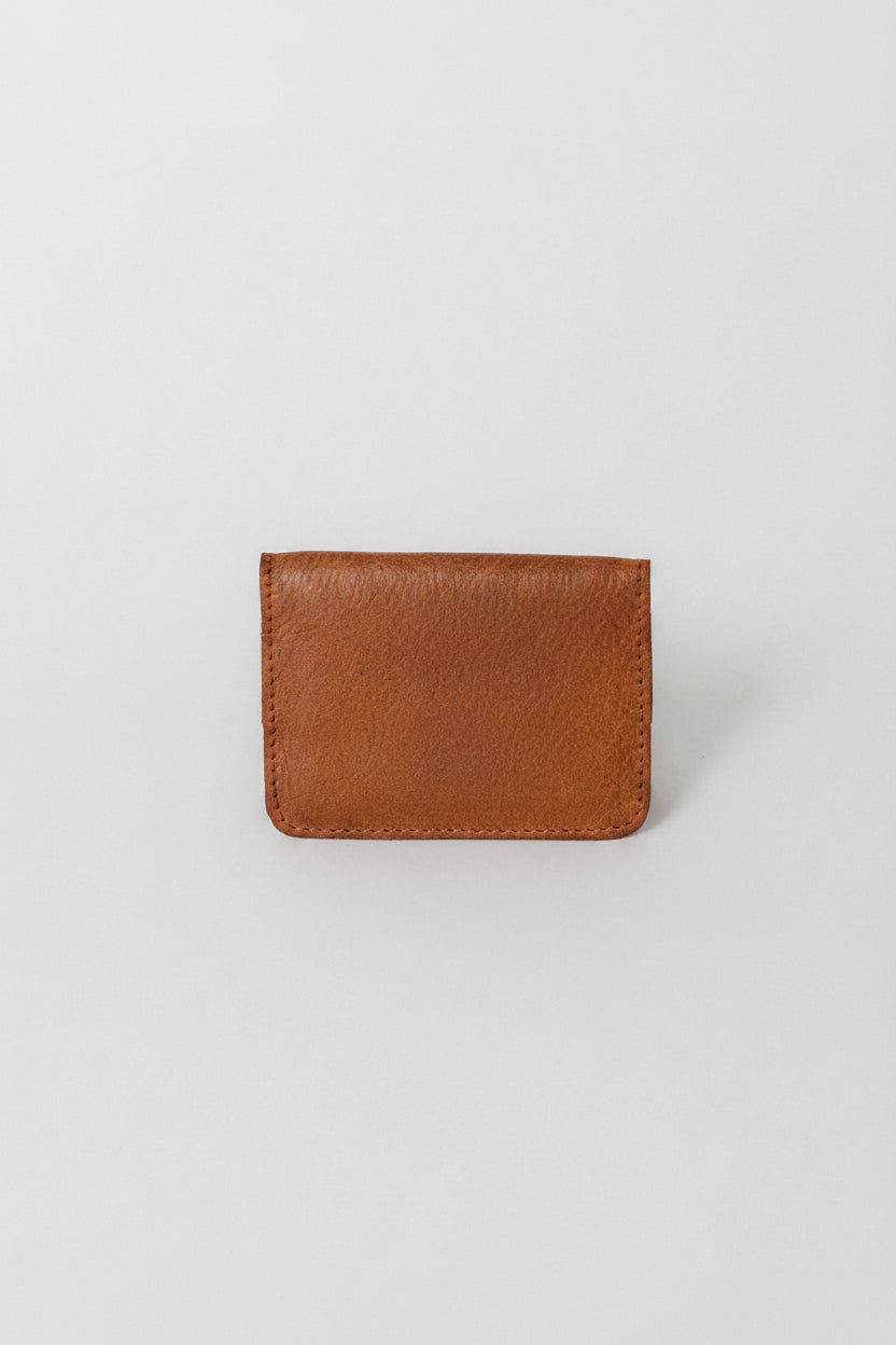 Fold over leather wallet in the color brown, a simple sleek design that holds up to 10 credit cards, and some cash