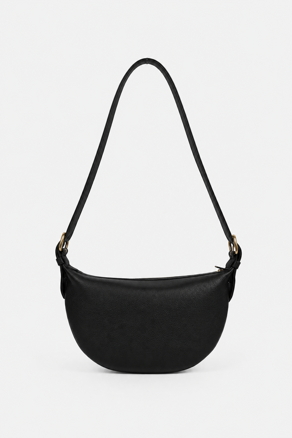 A black semi-circular shoulder bag with a long thin strap and small gold-tone hardware, shown against a plain light gray background.